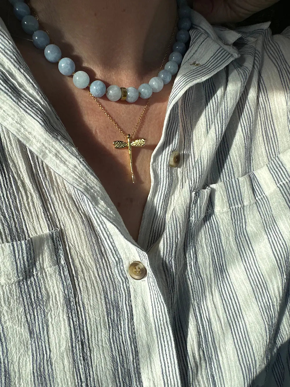 Guldsmeden kæde på hals